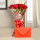 bunch of 10 red roses in a paper packing and a greeting card